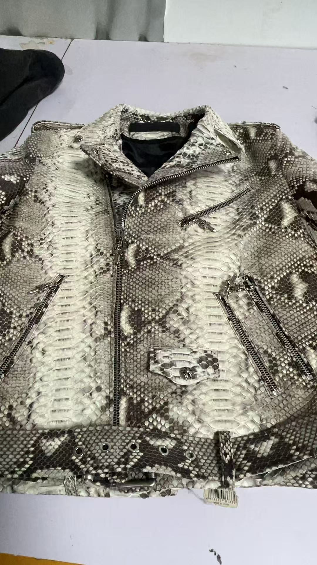 A completed textured leather biker jacket.