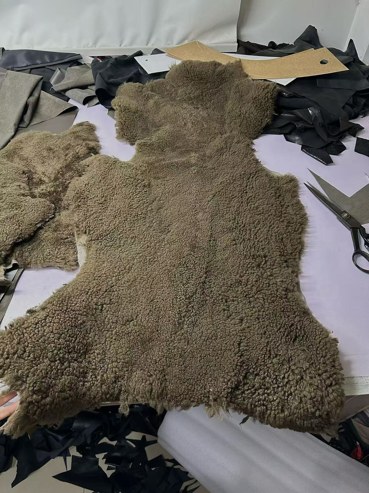Shearling positioned before cutting.